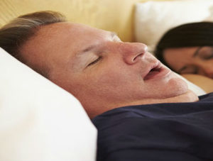why do men snore more than women