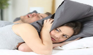 What causes snoring?